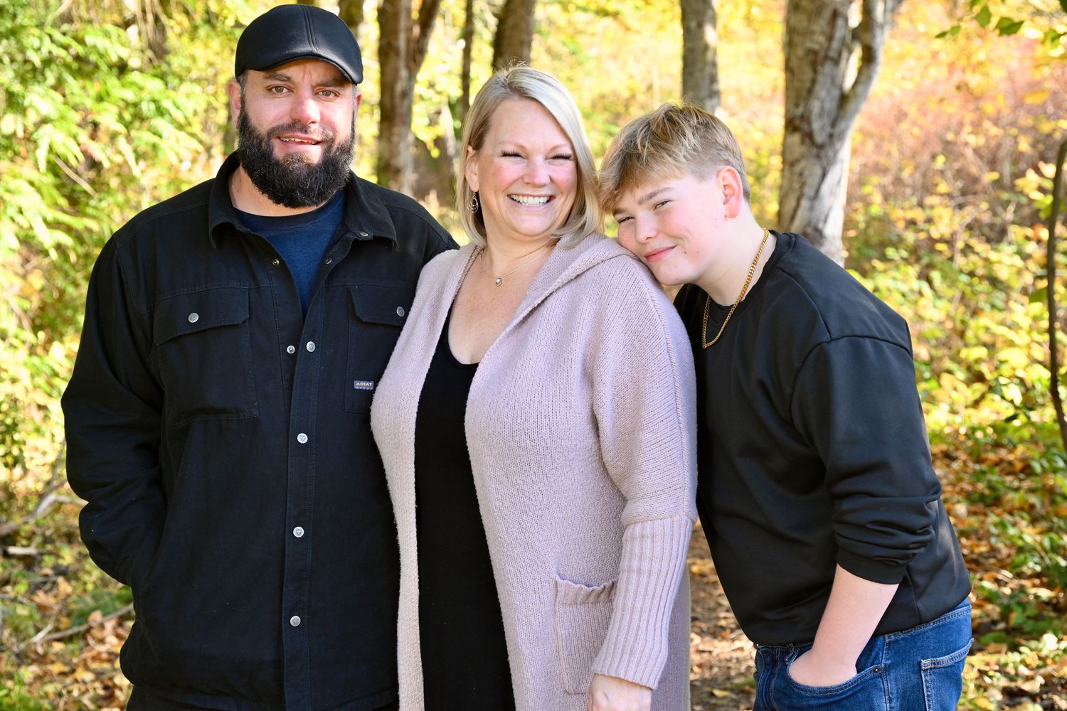 Family portrait session at Battle Point Park on Bainbridge Island, WA. Parents with son.