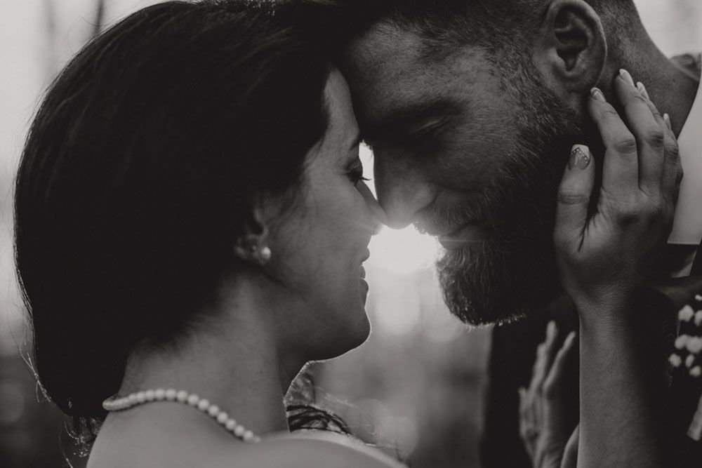 Intimate black and white close-up wedding portraits capturing romantic moments.