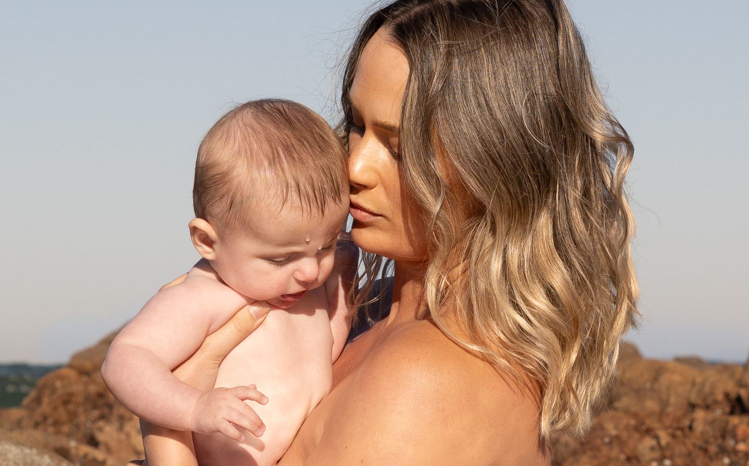 Mother and baby pictured after taking a swim at sunrise in Port Stephens.