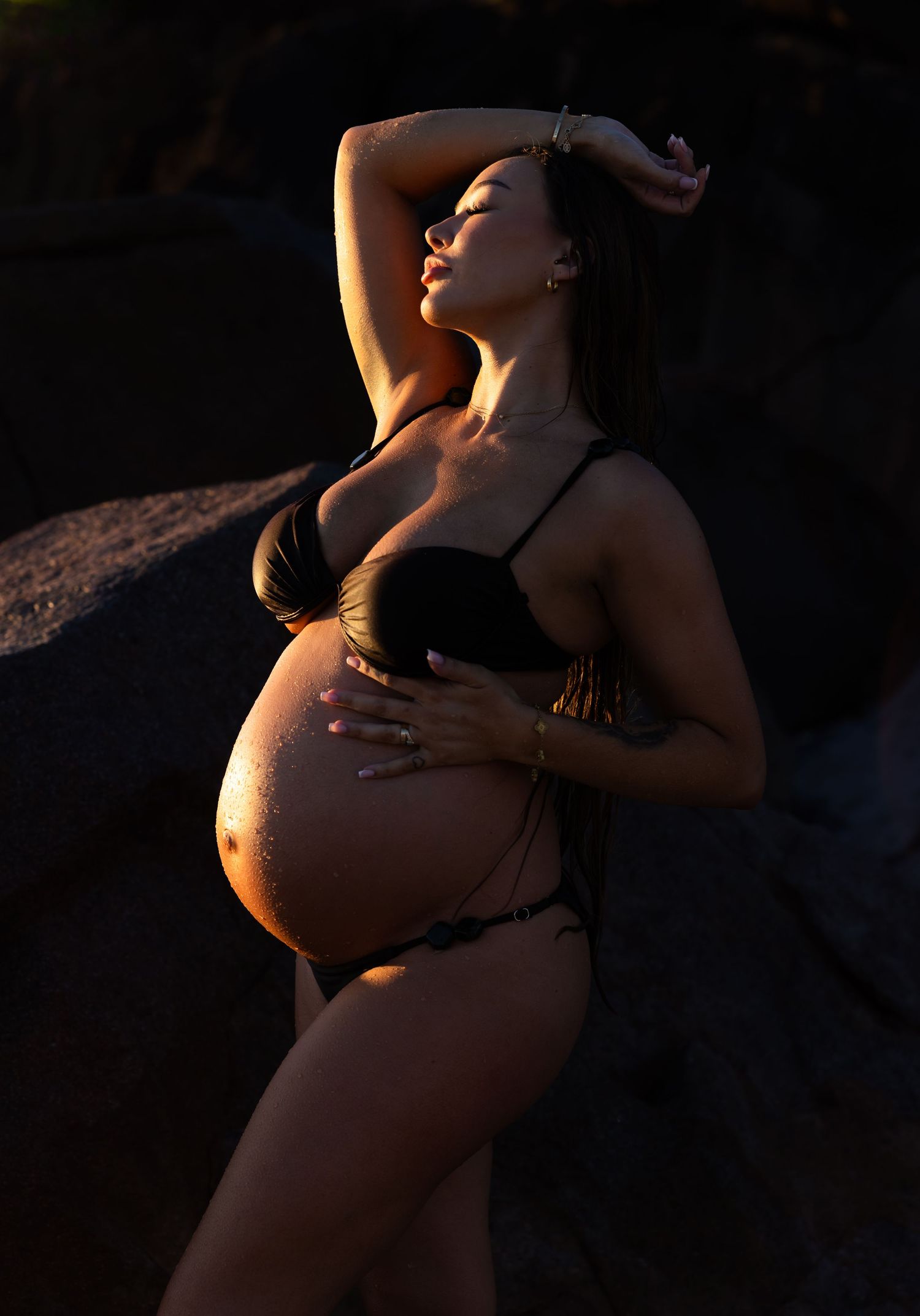 Maternity photoshoot at sunrise with a swim at the beach.