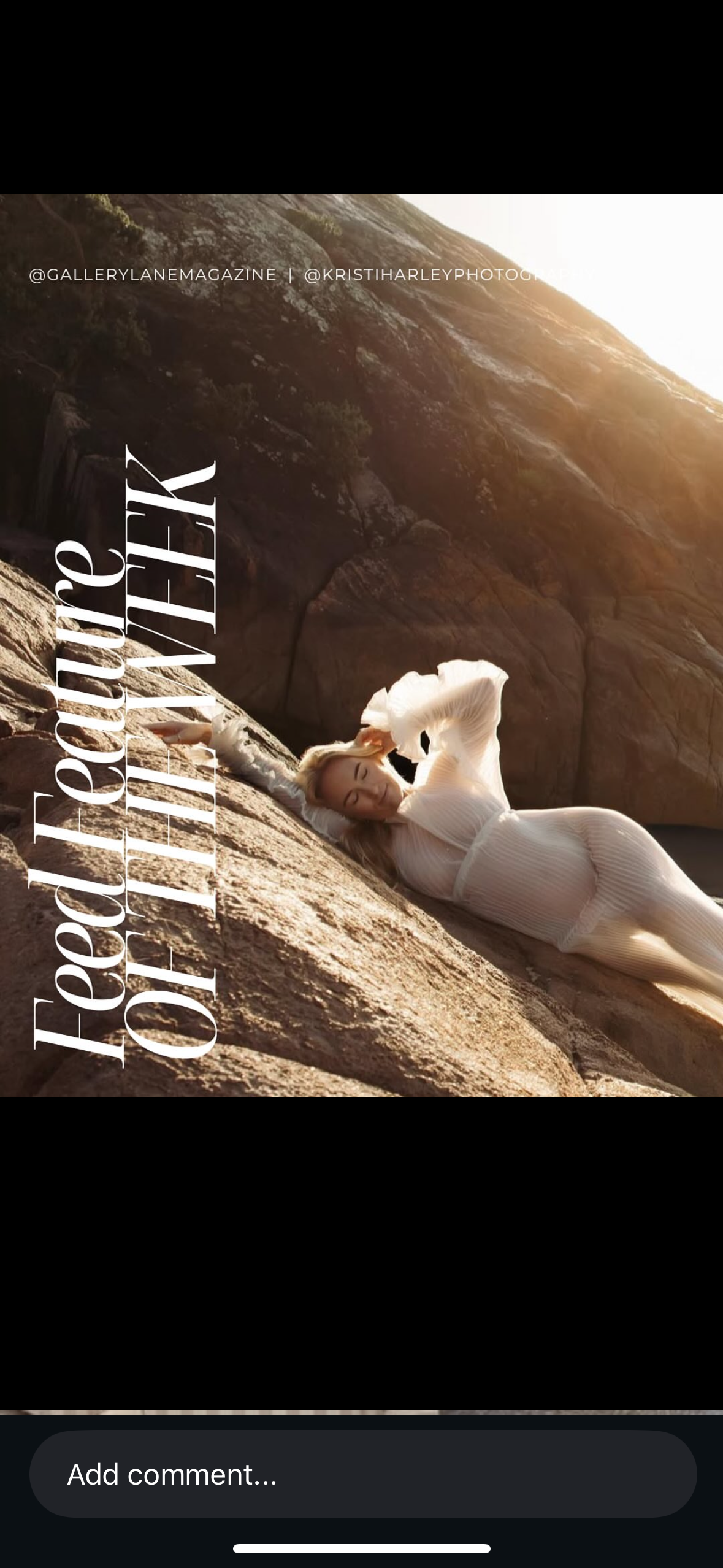 Pregnant woman leans on rocks as the sunlight glows behind her.
