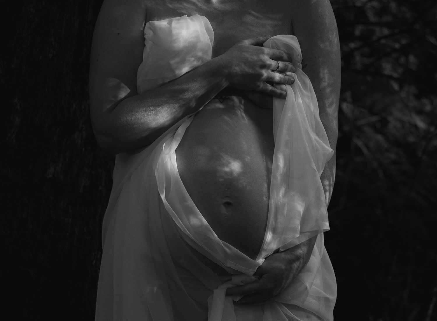 Maternity photography session in the bush at Glenrock with draped fabric.