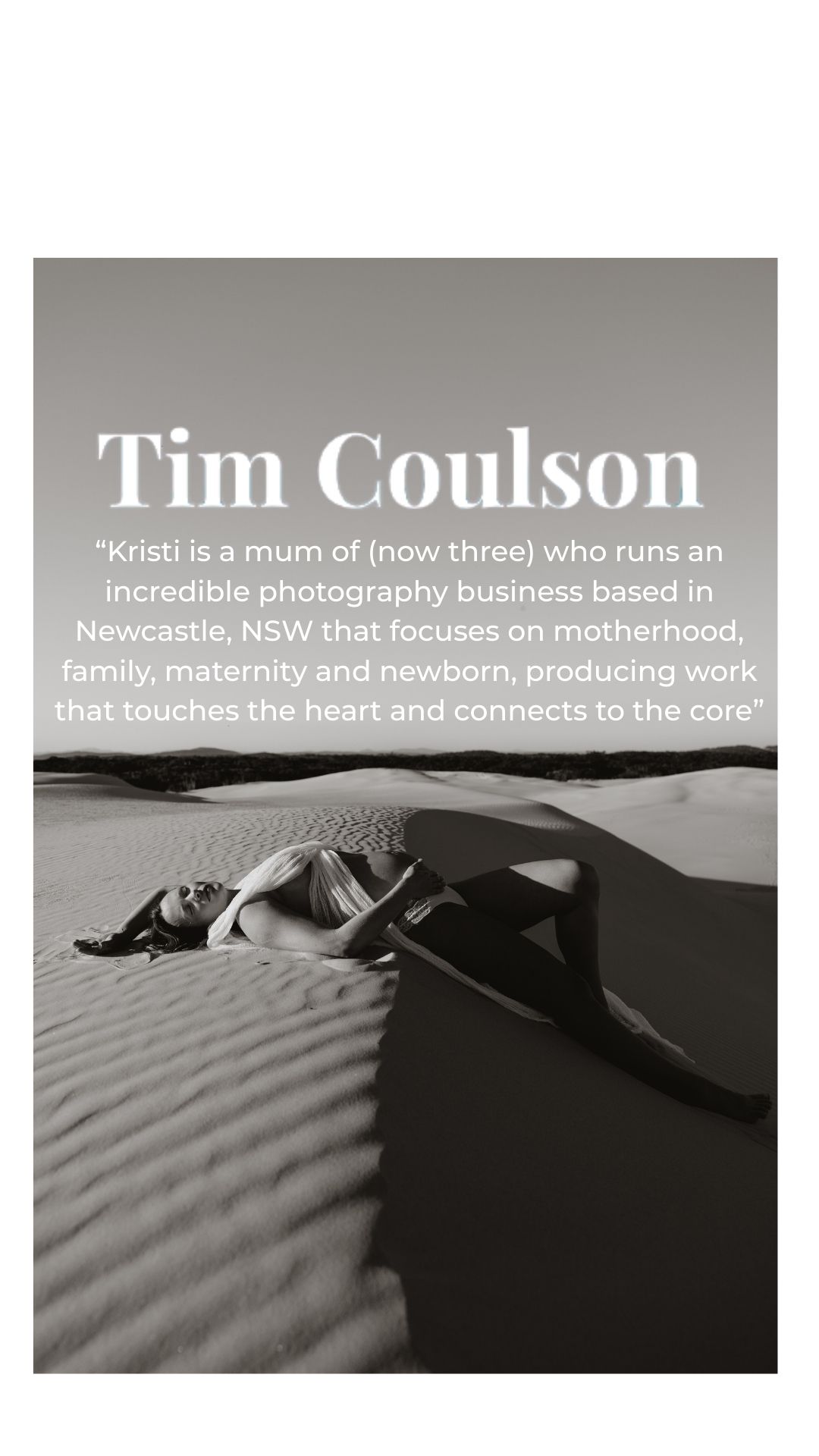 Woman lays over crest of sand dune.