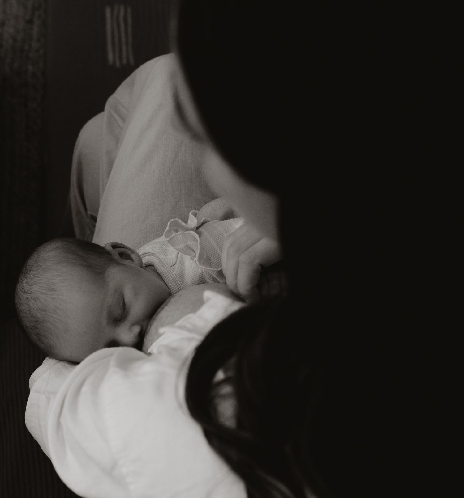 Mother breastfeeding her baby in Newcastle.