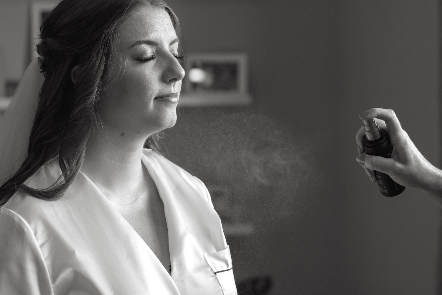 Black and white portrait series showing joyful expressions.