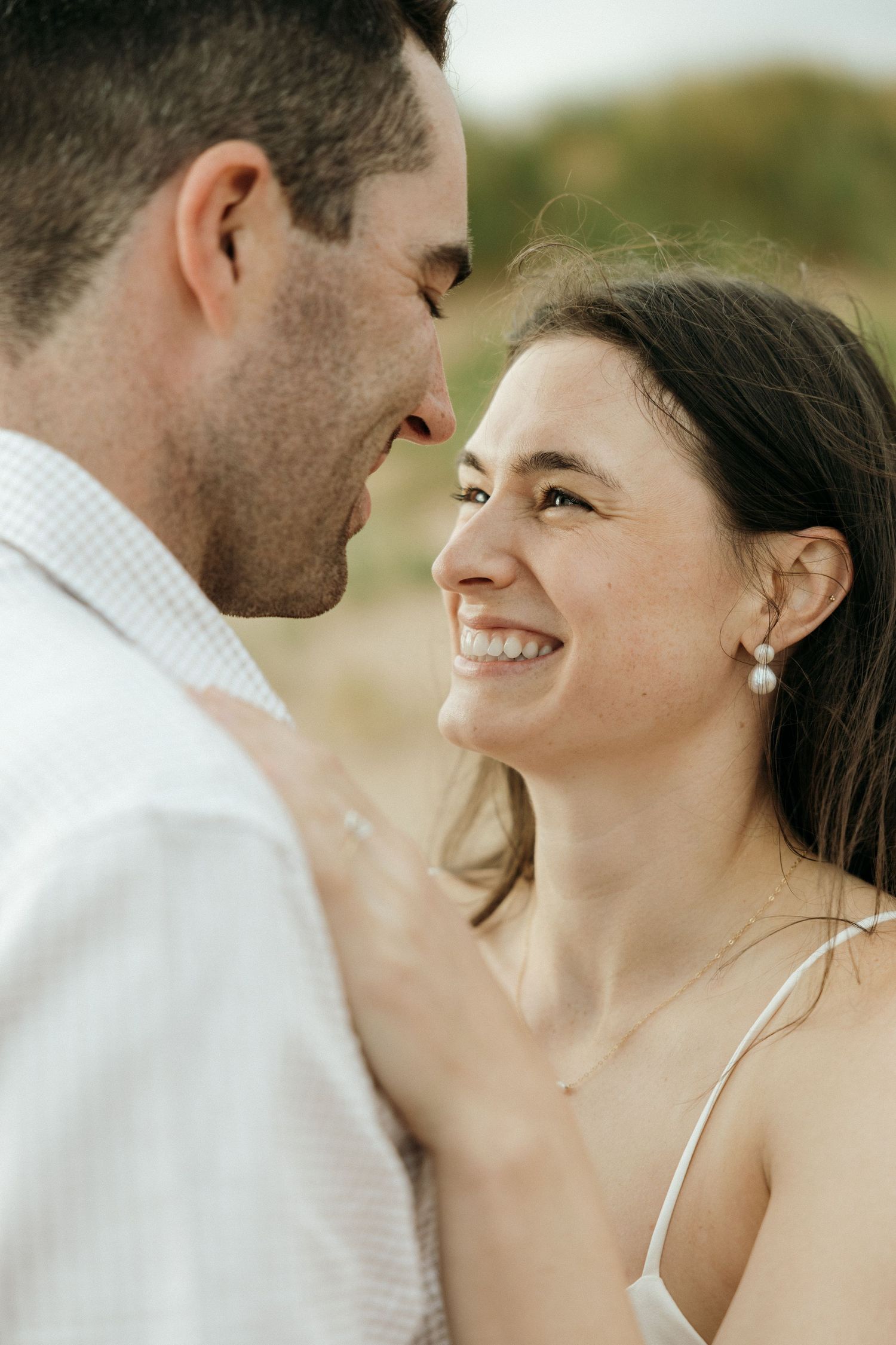 Series of intimate close-up shots showing a couple's loving expressions.