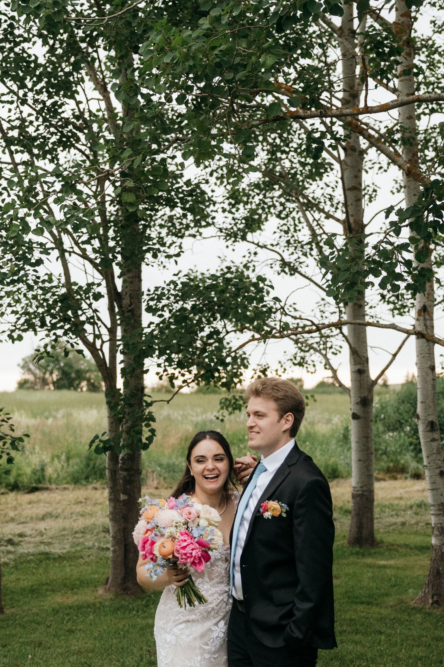 A romantic wedding photo sequence showing a couple laughing together in a wooded outdoor setting.