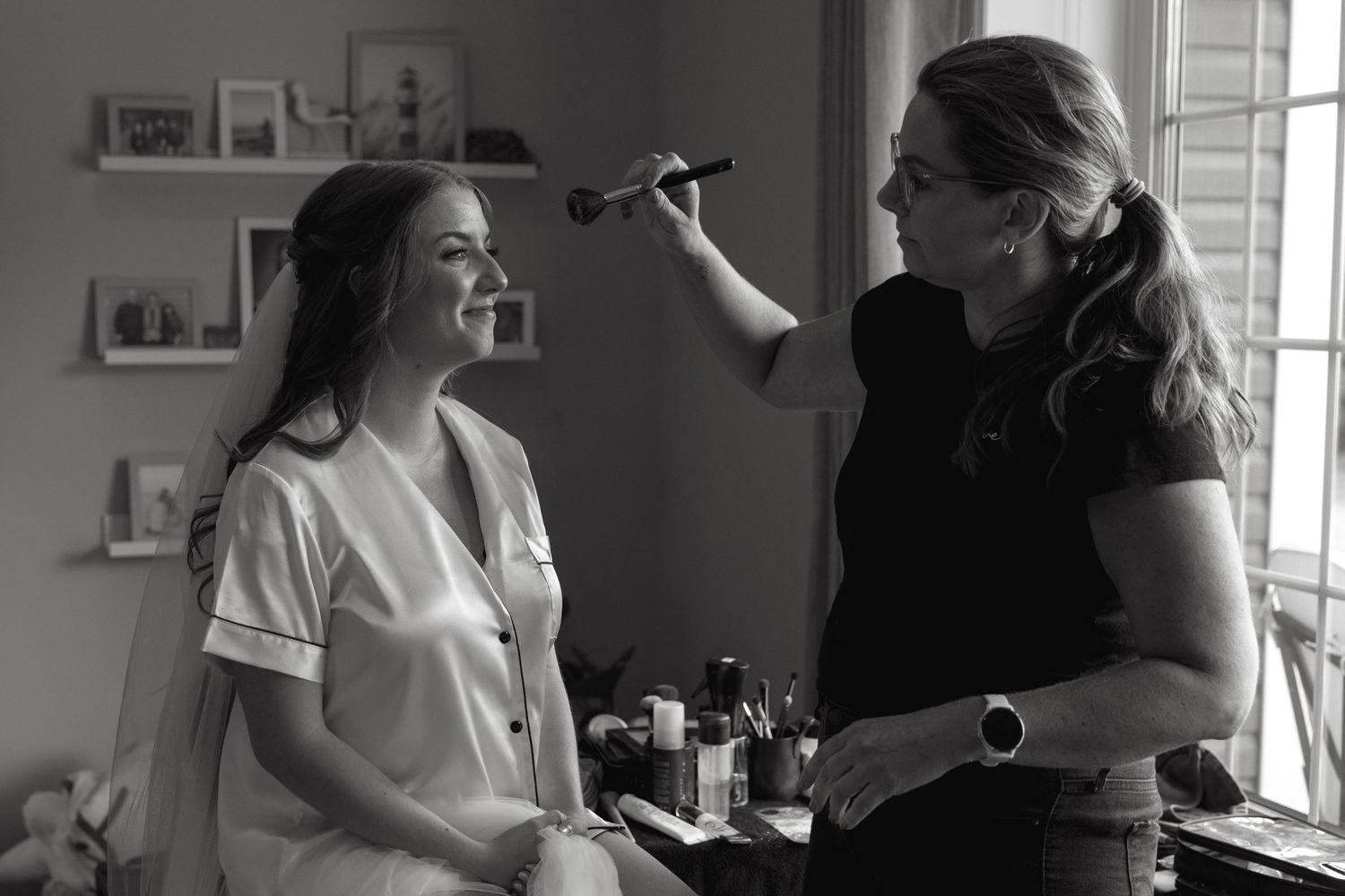 Black and white candid moments during morning preparations.