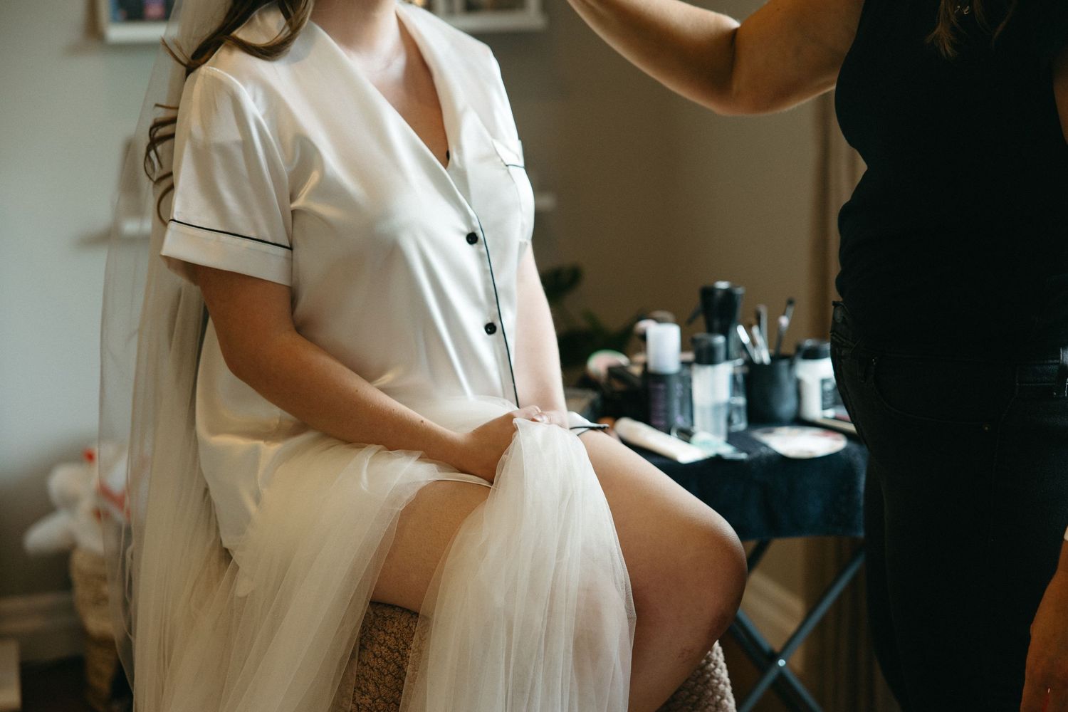Preparation moments captured in soft natural window light.