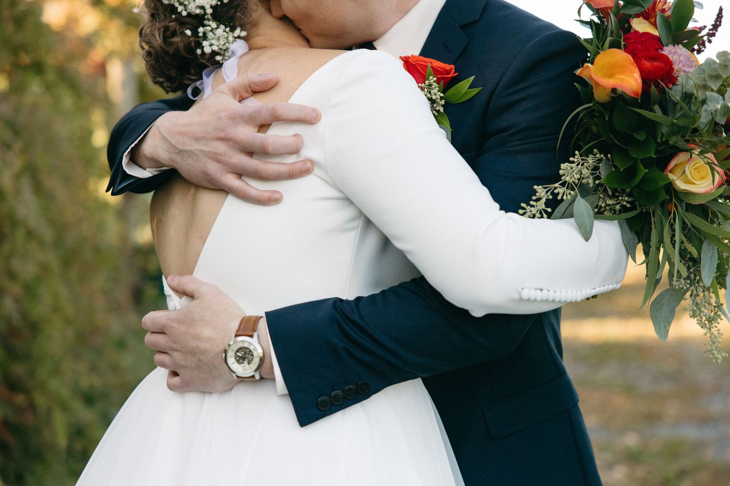 Intimate wedding embrace details captured in a series of close-up shots.