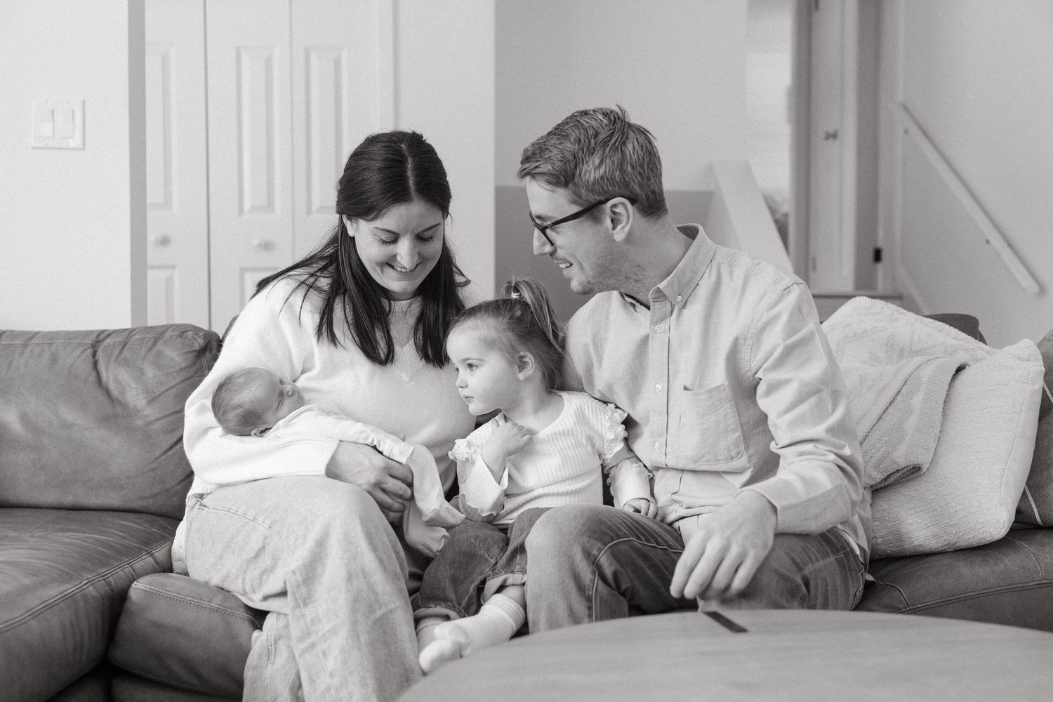 Collection of lifestyle family photos showing tender moments in bright interior setting.