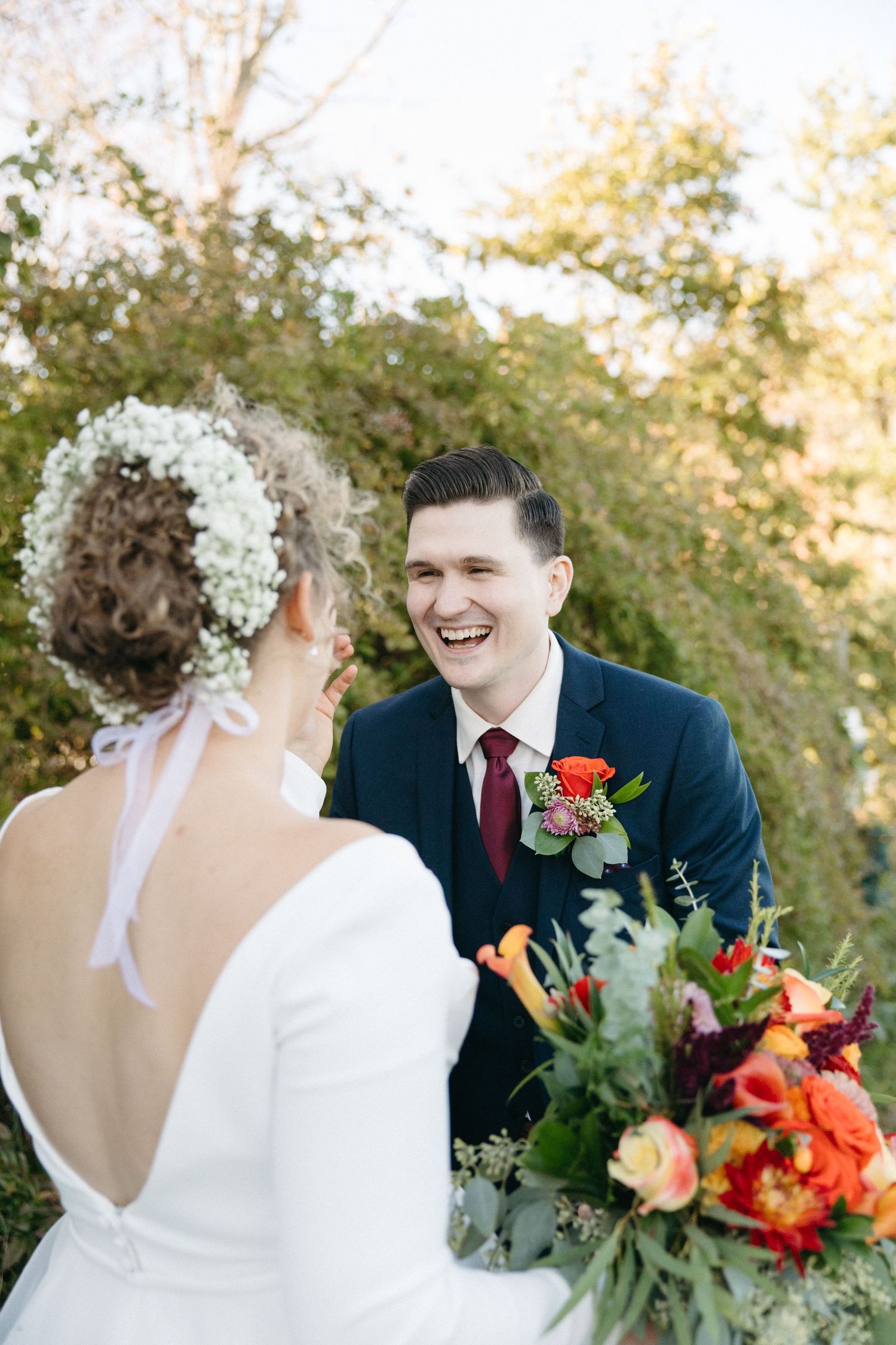 A joyful wedding moment captured in sequence with vibrant fall florals and natural lighting.