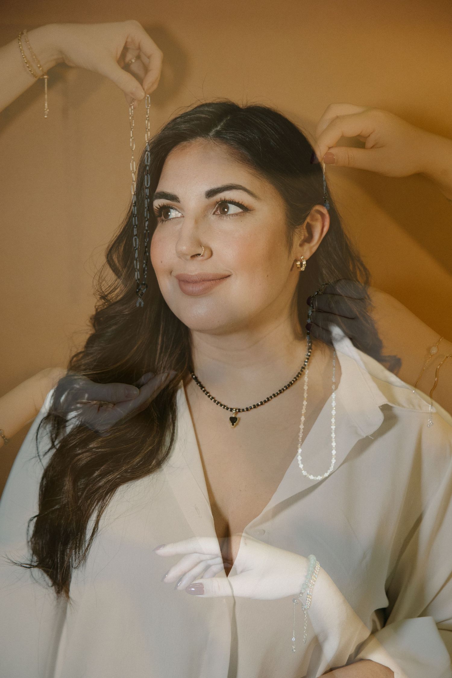 Portrait series showing a person in a white button-down shirt with dark hair against a warm-toned background.