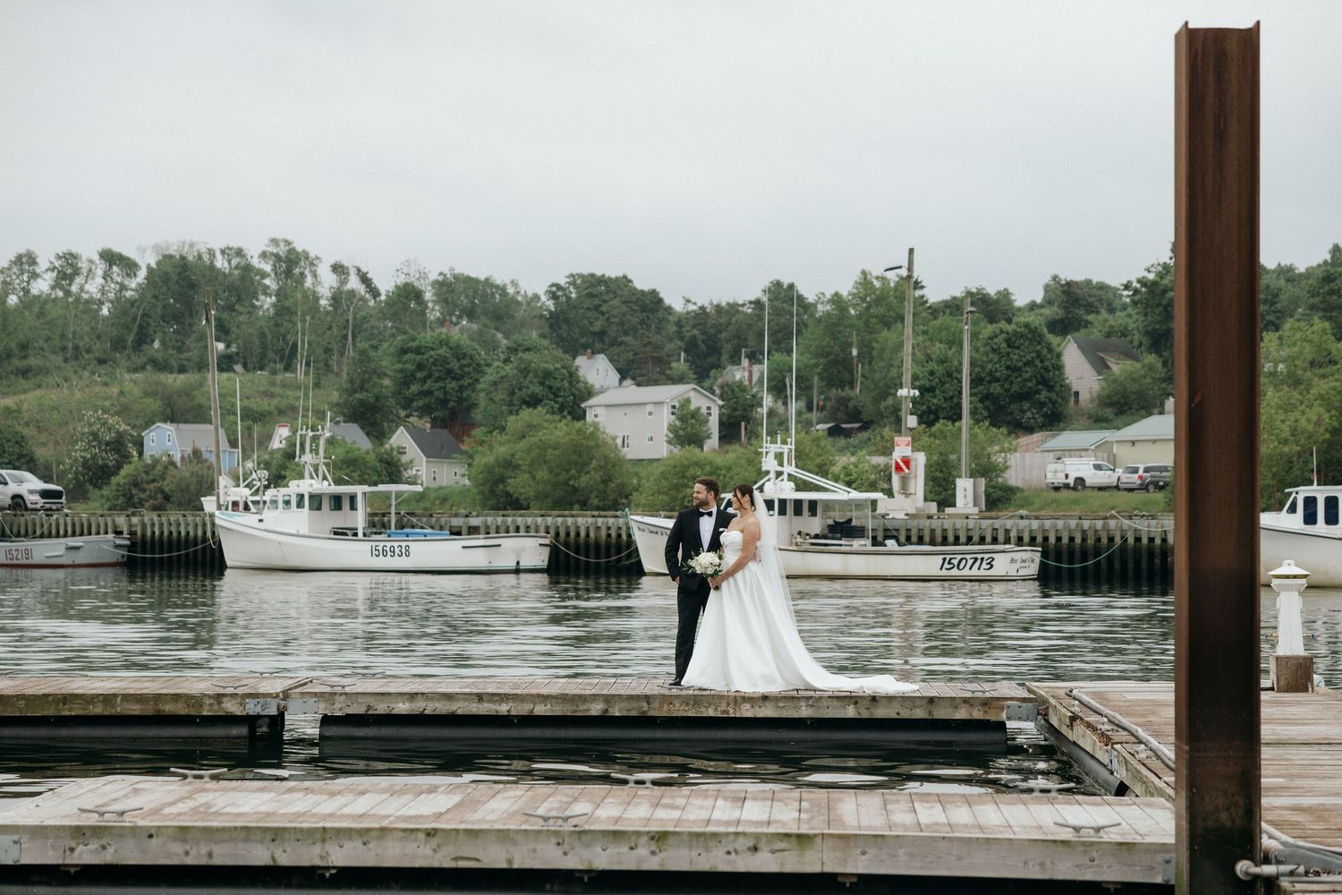 A panoramic wedding photo sequence on a waterfront dock with boats in the background.