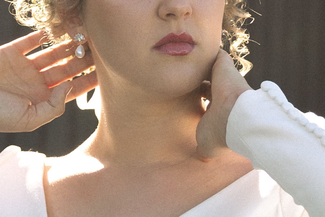 Close-up artistic wedding portraits with soft lighting and delicate details.