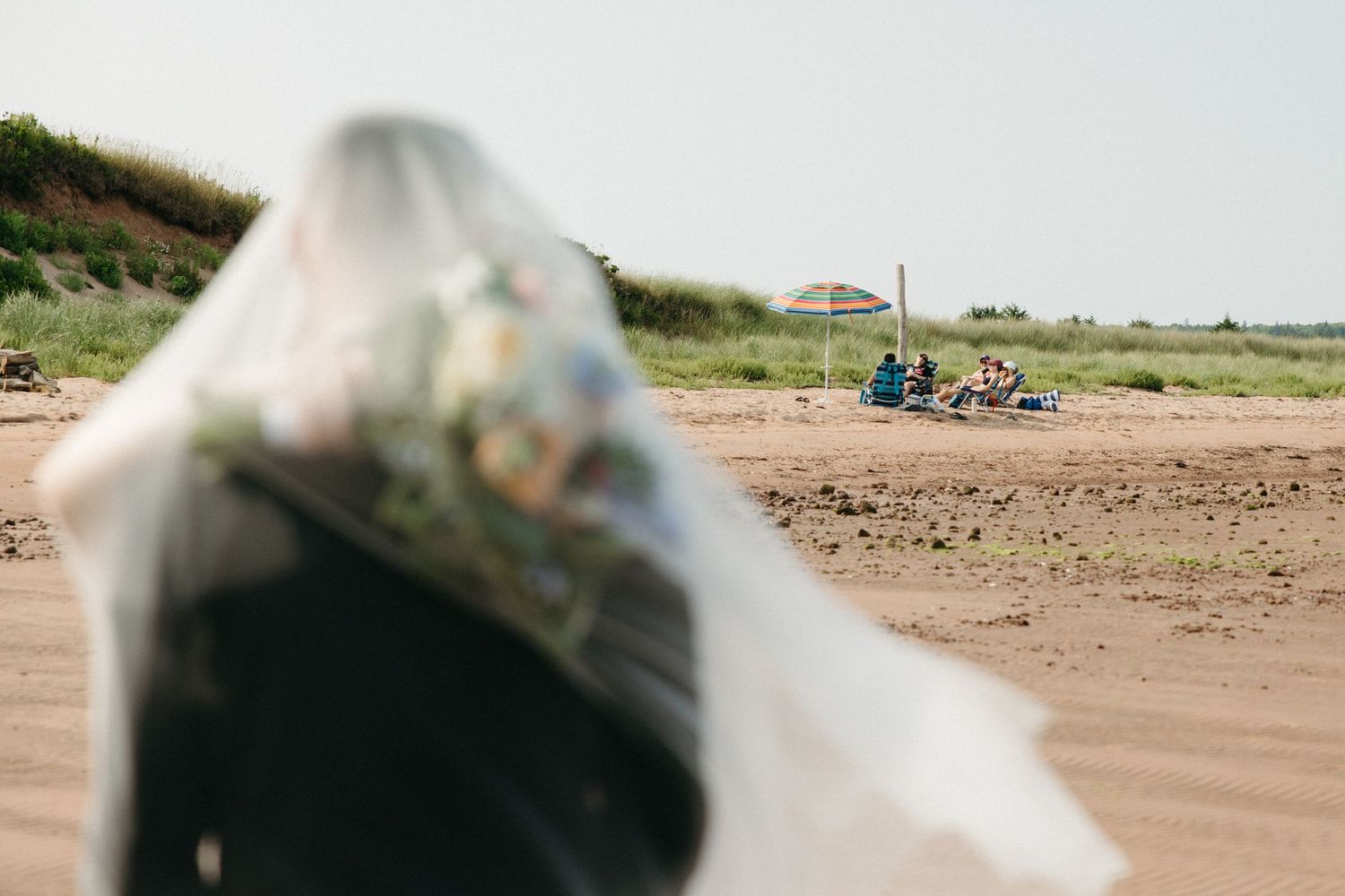 Abstract close-up wedding photography with soft focus and blurred elements.