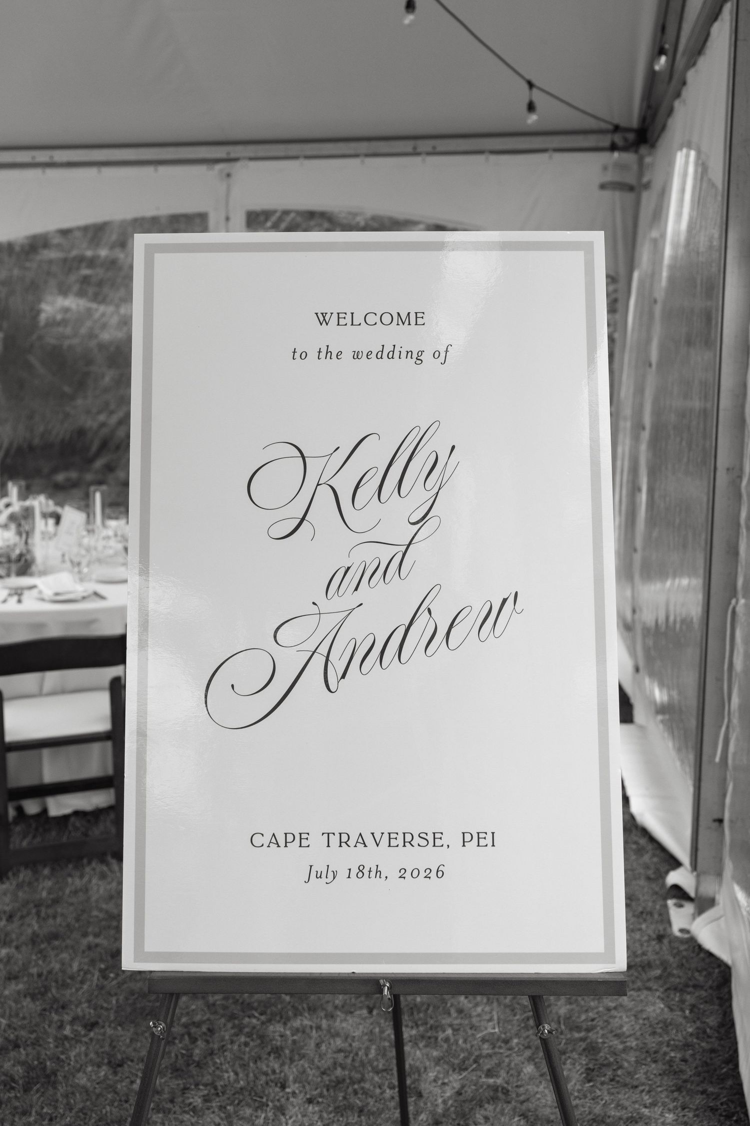 Black and white welcome sign for Kelly and Andrew's wedding at Cape Traverse, PEI, July 18th 2026.