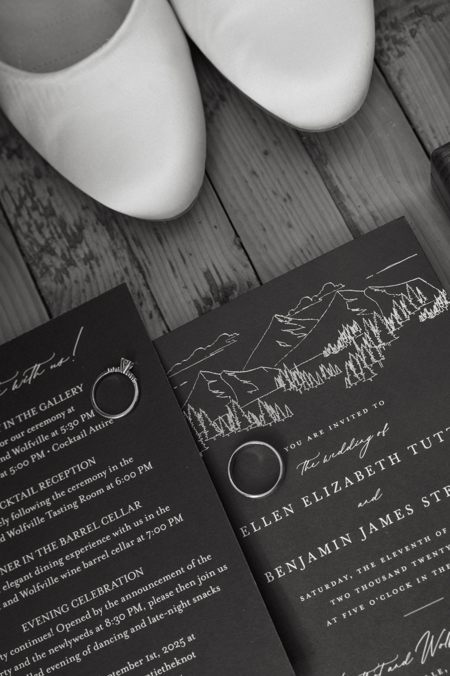 Black wedding invitations with white calligraphy text laid out in sequence.