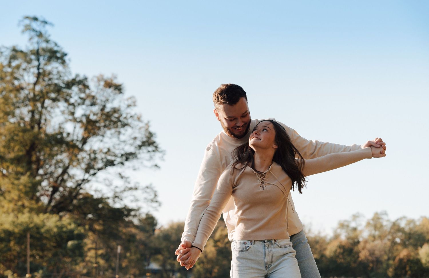 Couple enjoying a romantic sunset during engagement photoshoot in Middletown. PA