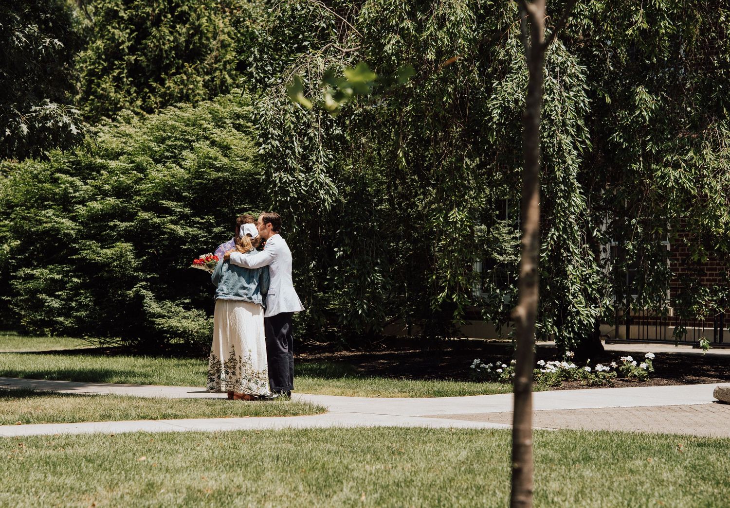 best friends hugging celebrating engagement proposal at Gettysburg College, PA