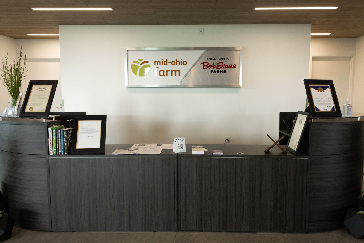 Mid-Ohio Farm radio reception desk in modern office interior.