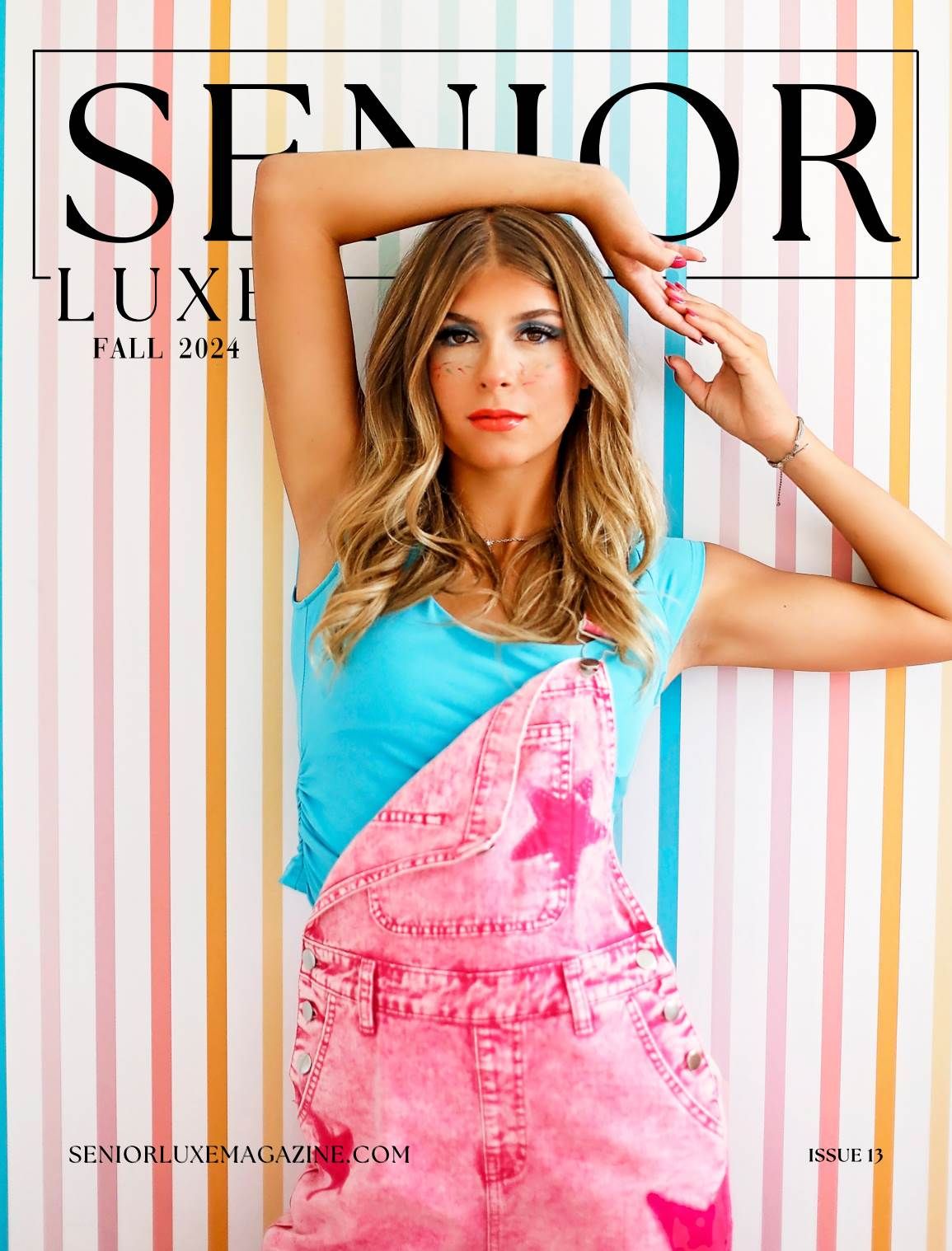 Senior portrait photo shoot with pink and white striped backdrop and turquoise accents.