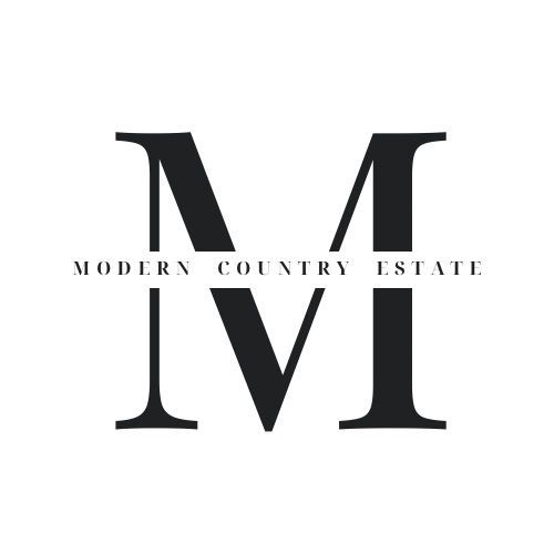 Modern black and white logo design with the letter M displayed in a minimalist, geometric style against a white background.