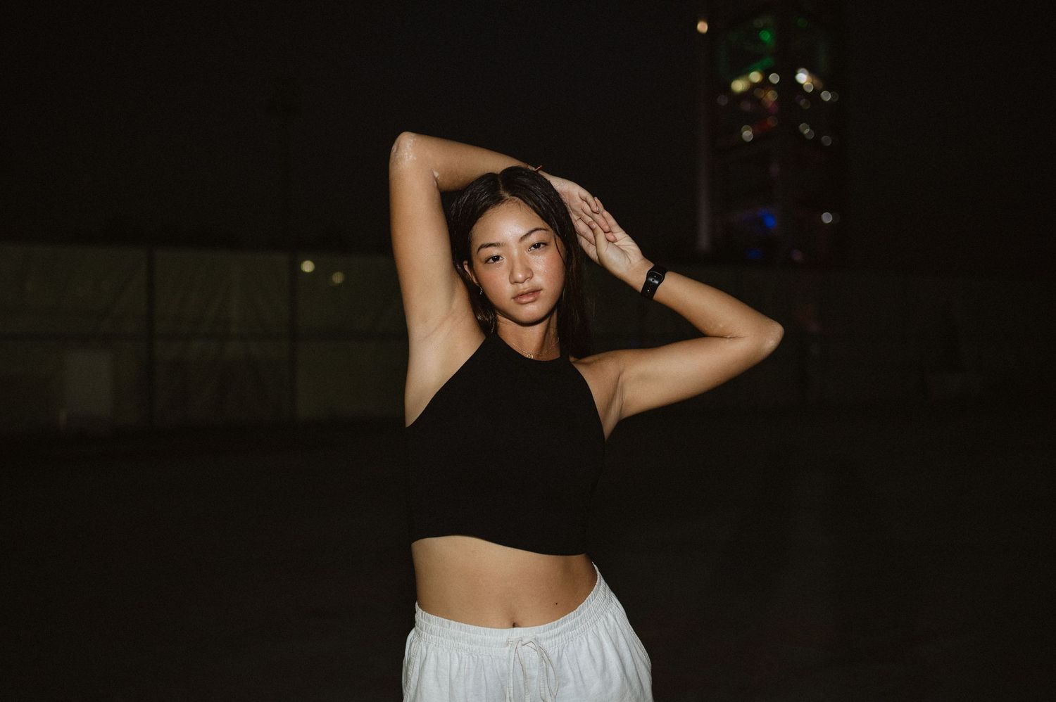 Asian girl modelling in the dark.
