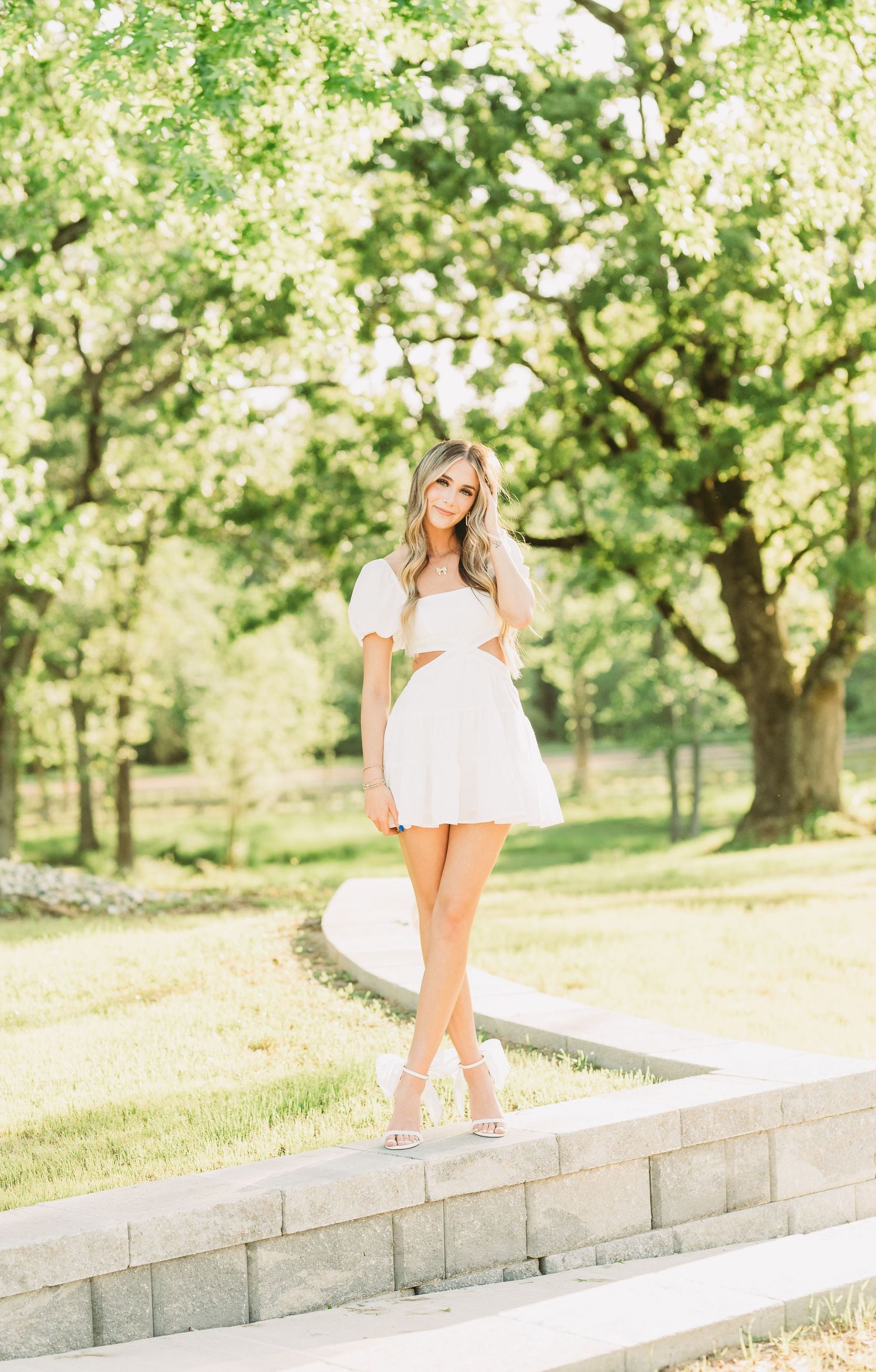 Senior girl walking outdoors during a natural light senior photography session in East Texas