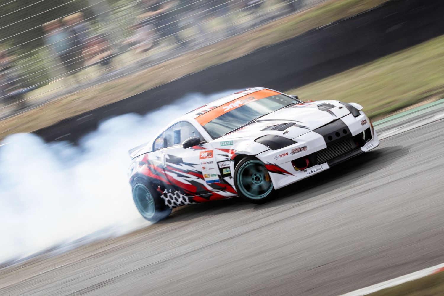 Drift car going round Brands Hatch