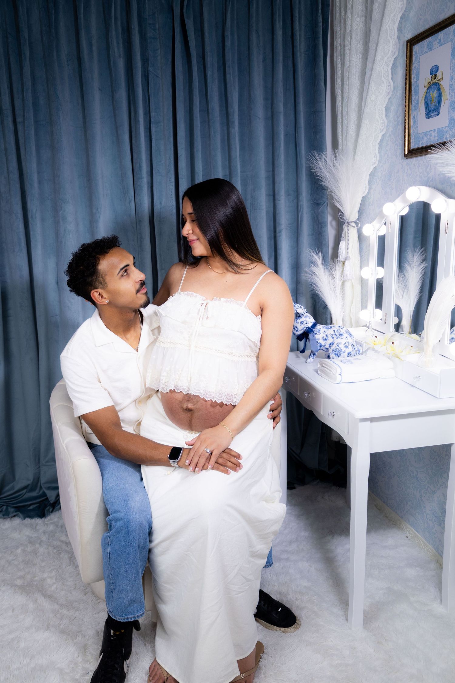 Blue Old Hollywood vanity photography set with vintage décor, ideal for elegant maternity photoshoots at Hidden Frames Studio in Las Vegas.