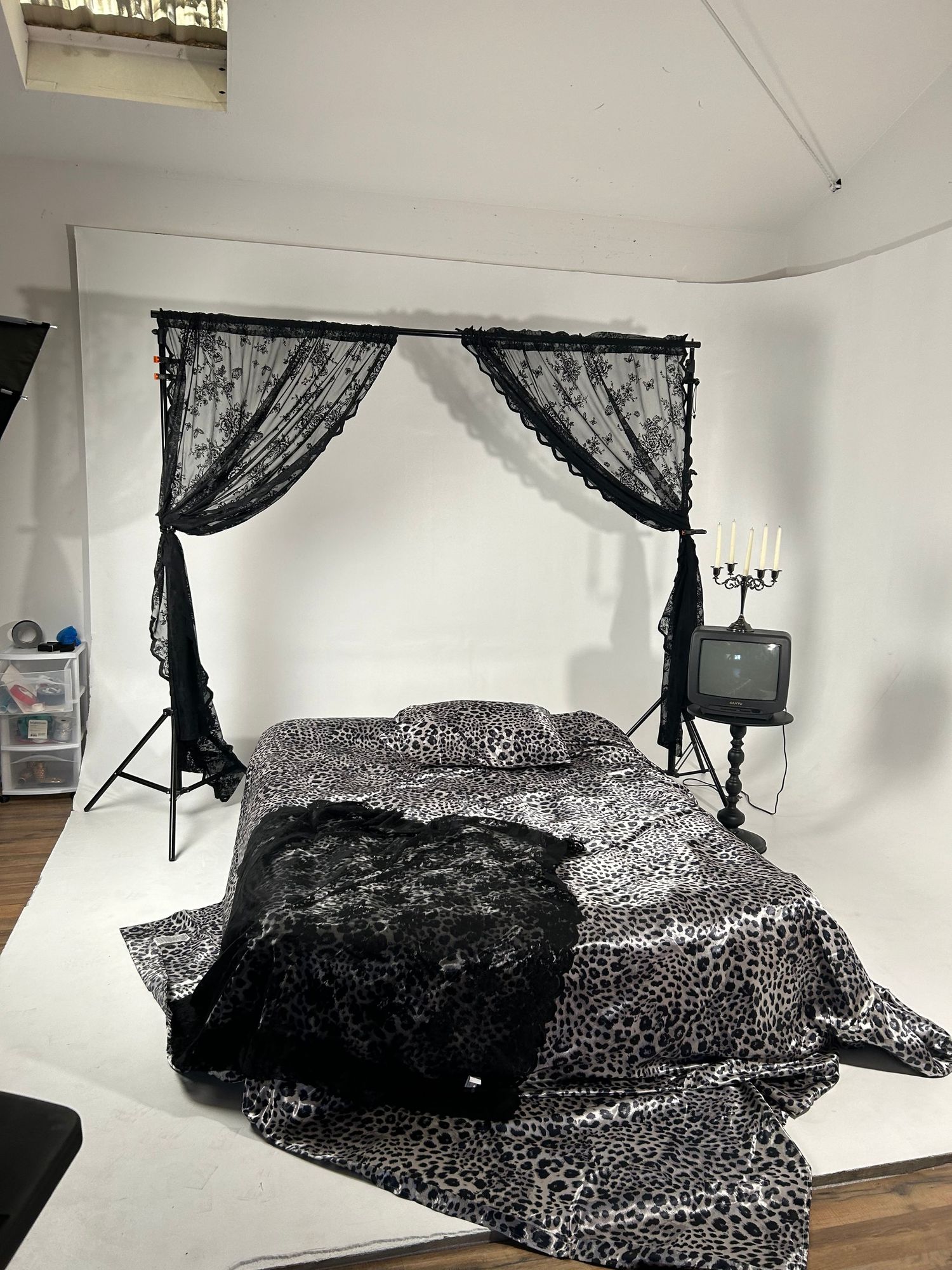 White wall photography set with spotlight lighting, offering a clean and versatile space for creative portraits, , fashion in las vegas