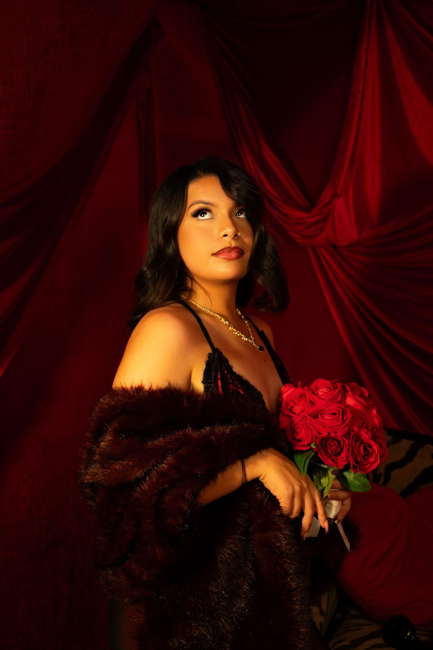 Vintage Y2K red velvet and cheetah-print room at a Las Vegas photography studio, perfect for bold fashion and birthday portraits.