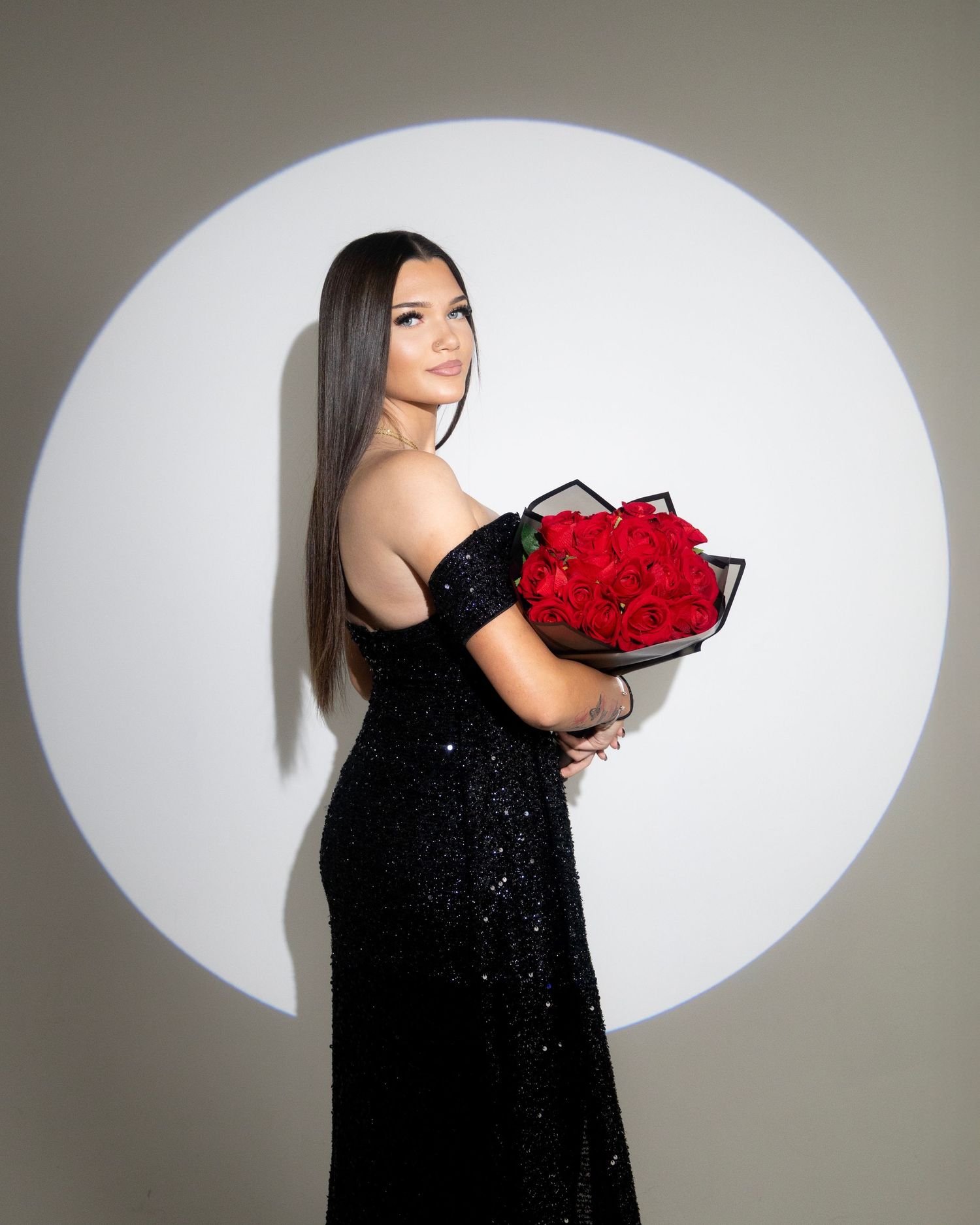 White wall photography set with spotlight lighting, offering a clean and versatile space for creative portraits, , fashion in las vegas