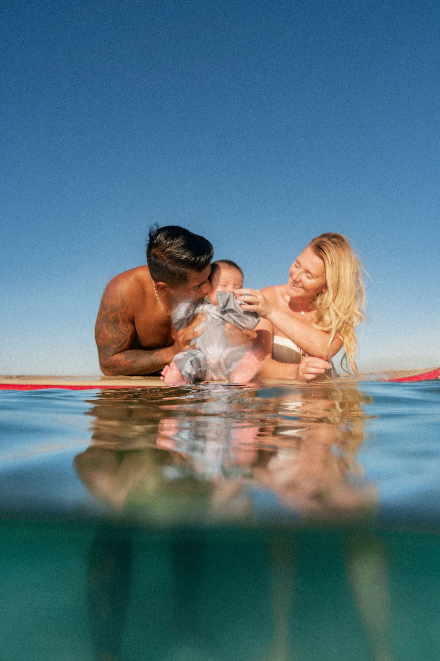 Cinematic underwater photo, in a documentary style, magical underwater photoshoot. Destination Elopement, maternity underwater photographer