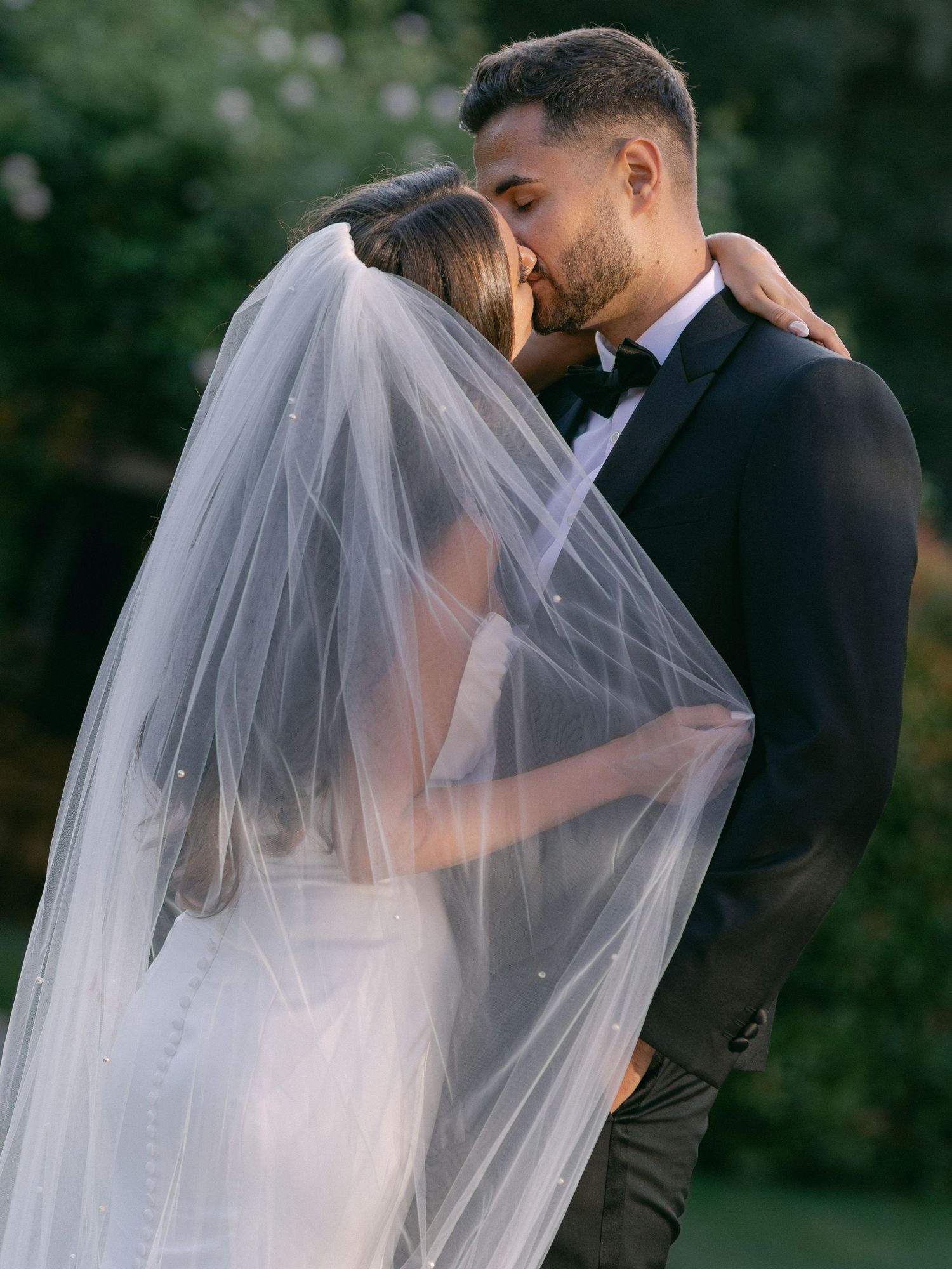 A romantic wedding photo sequence shows a couple in an intimate moment with the bride's veil flowing in the breeze.