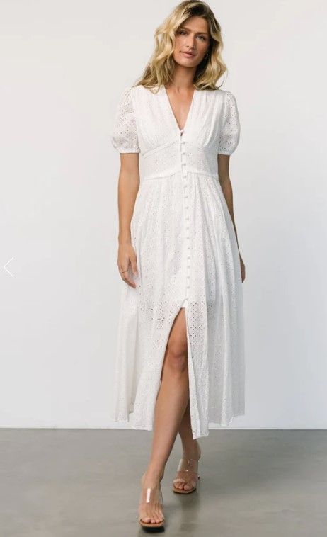White eyelet lace maxi dress with button front and side slit displayed in multiple views.