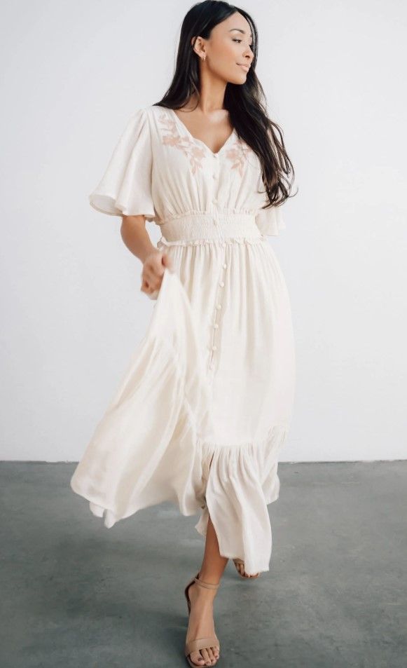 Ethereal cream-colored midi dress with flutter sleeves and tiered skirt shown from multiple angles.