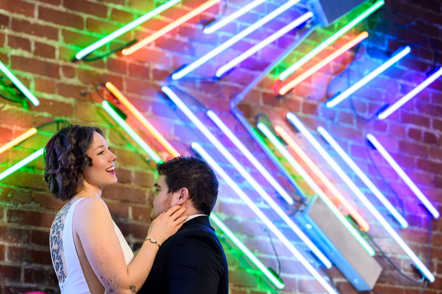 Couple during intimate engagement photography session at their favorite local coffee shop, candid and authentic Pittsburgh engagement photos