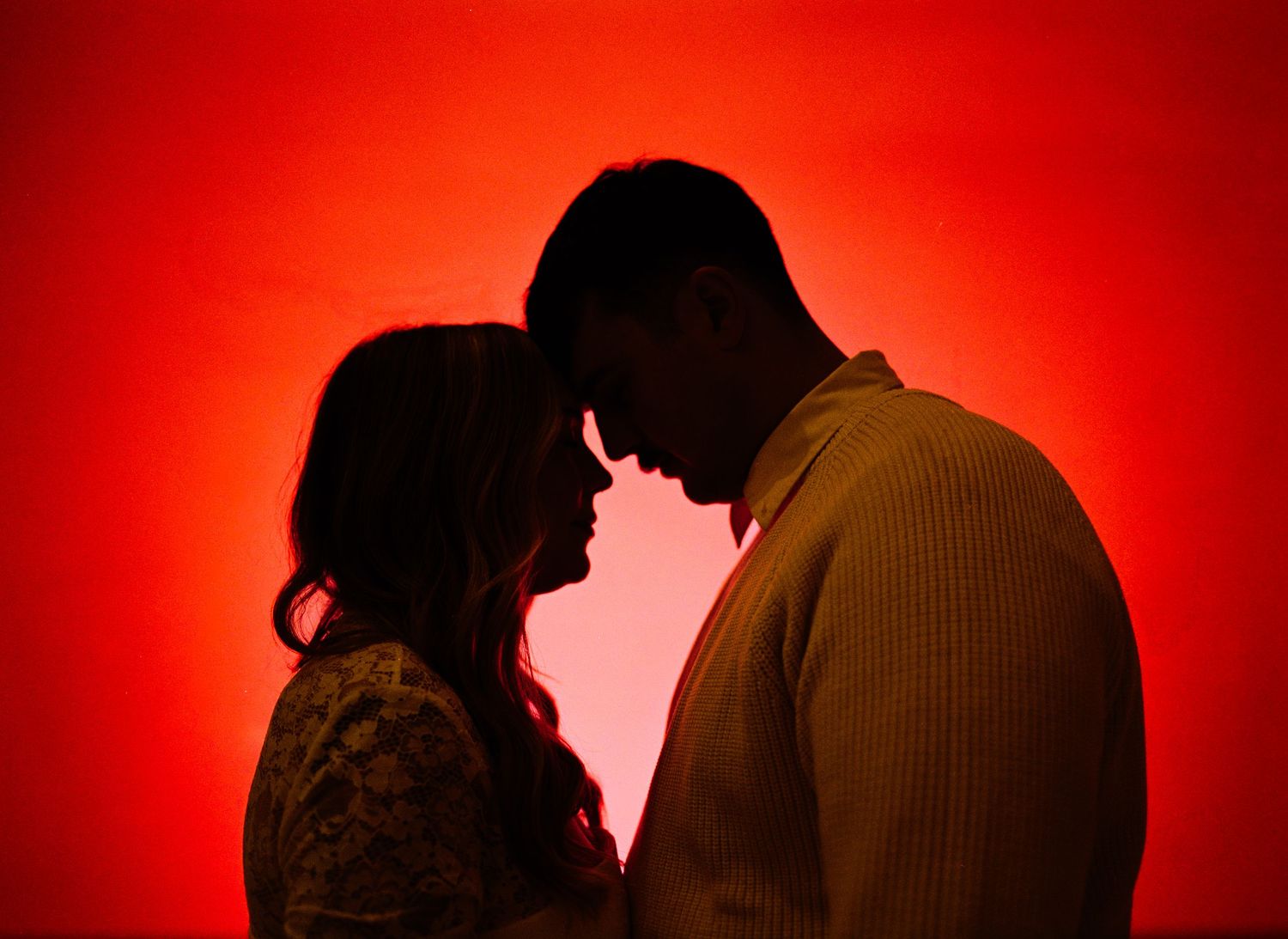 Couple at home during cozy in-home engagement photography session, authentic and intimate lifestyle engagement photos Pittsburgh PA.
