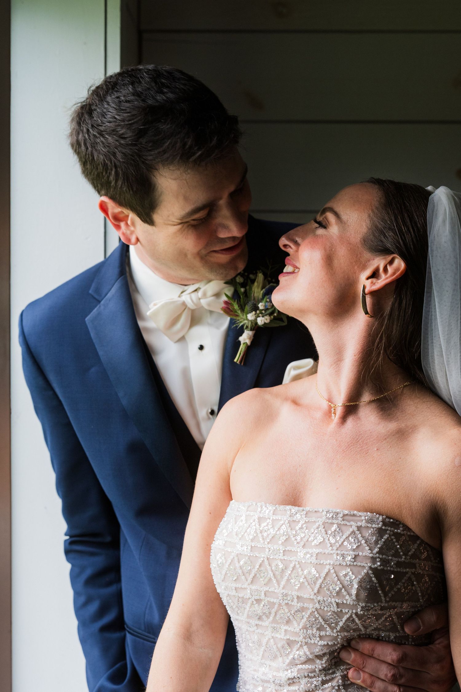 Intimate wedding portrait showing tender moment between newlyweds.  at shady elms farm pittsburgh pa photography and video