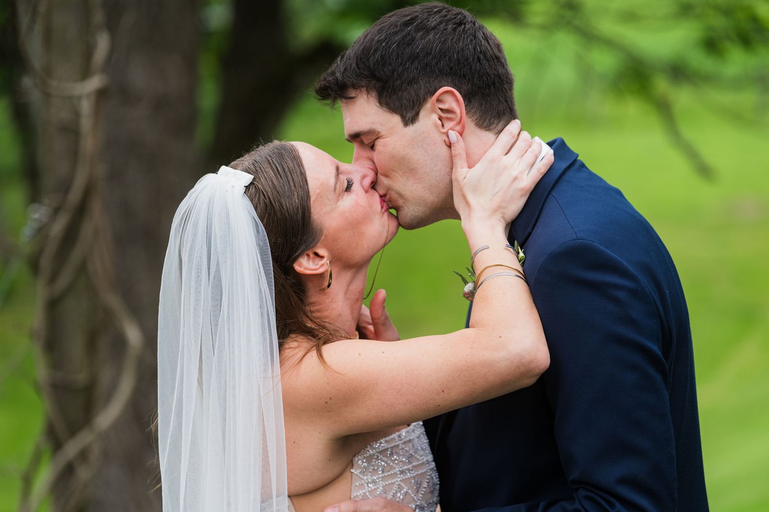 Intimate moment captured between couple in outdoor garden setting.  at shady elms farm pittsburgh pa photography and video