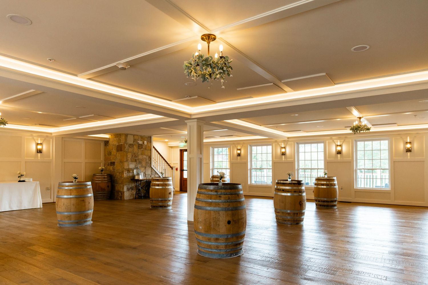 Westbrook Inn wedding cocktail hour reception area wine barrels with centerpieces Derry NH