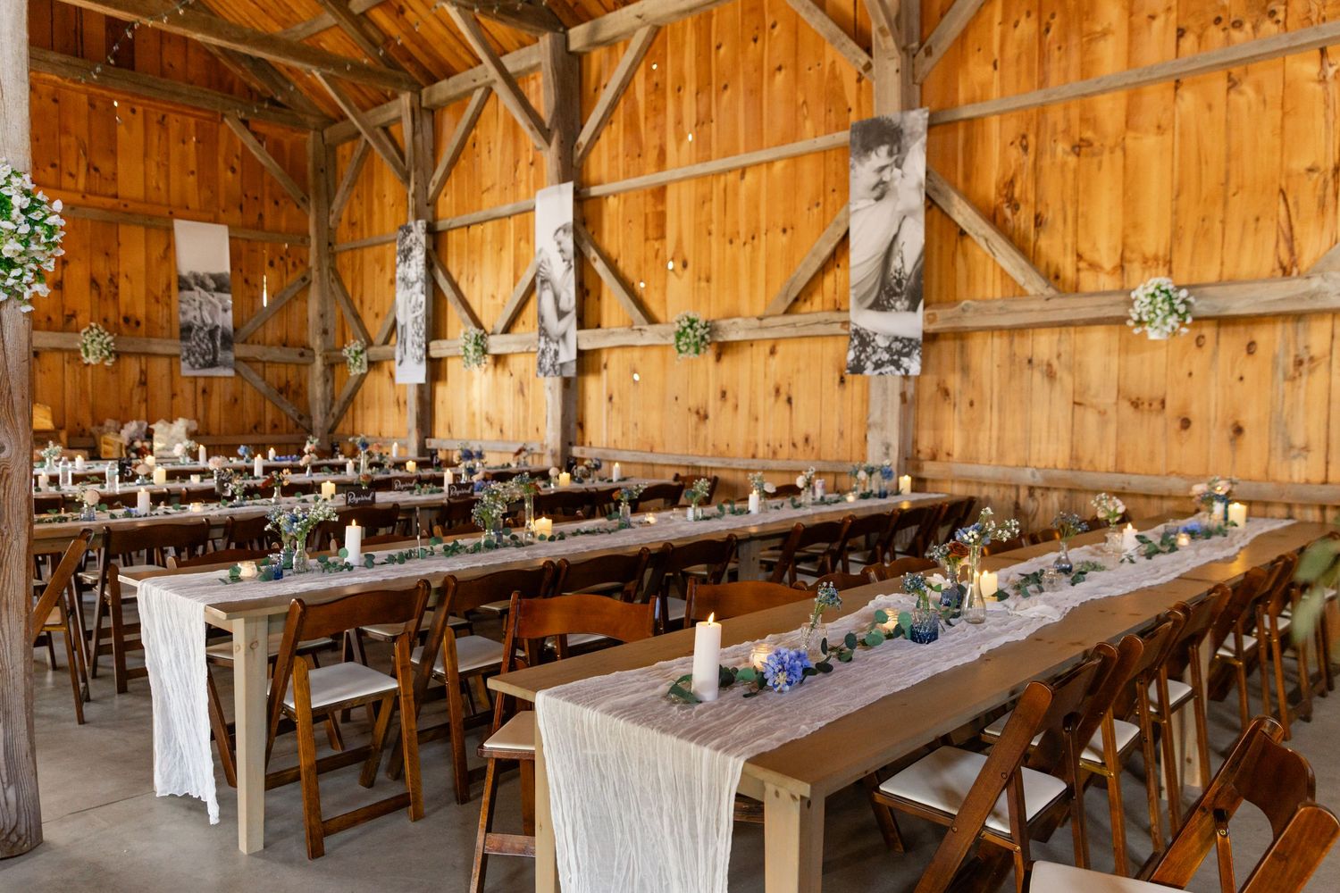 Kitz Farm wedding reception table layout family style with table runners floral centerpieces and candles Strafford NH
