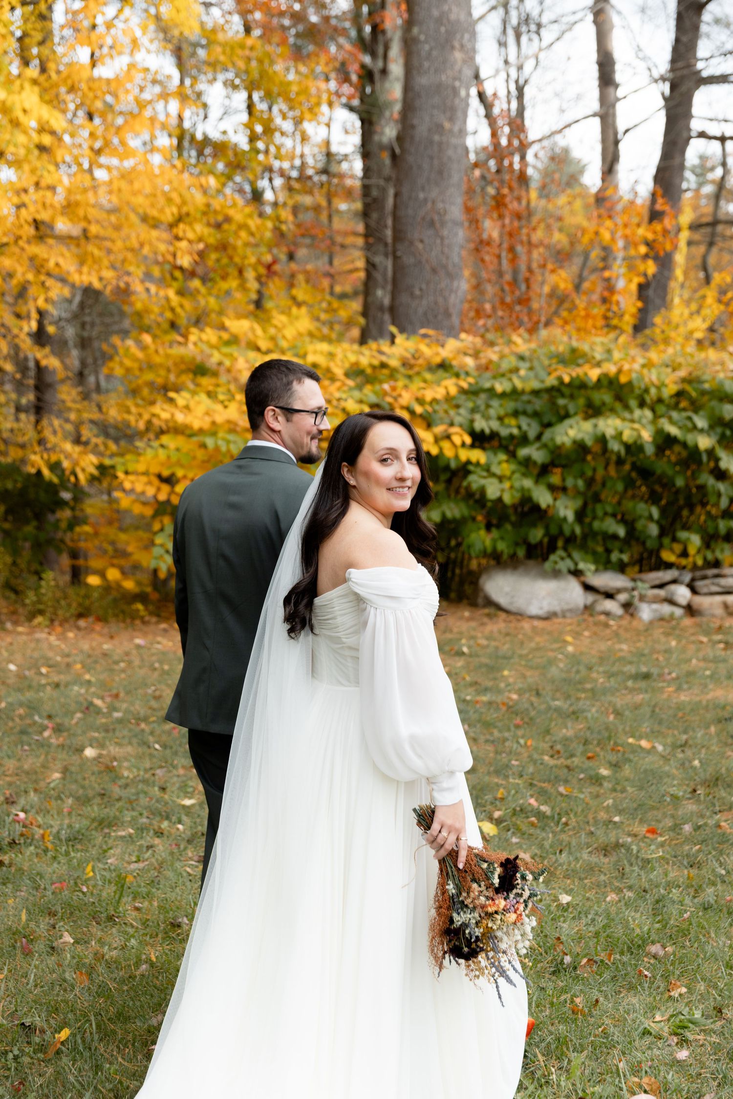 Portrait of bride and groom at fall wedding at Kitz Farm in Strafford, NH