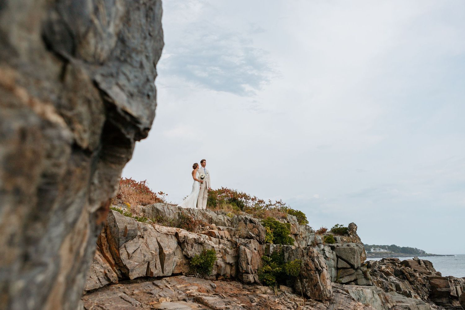 Stage Neck Inn wedding portraits on cliff bride and groom coastal ocean view portraits