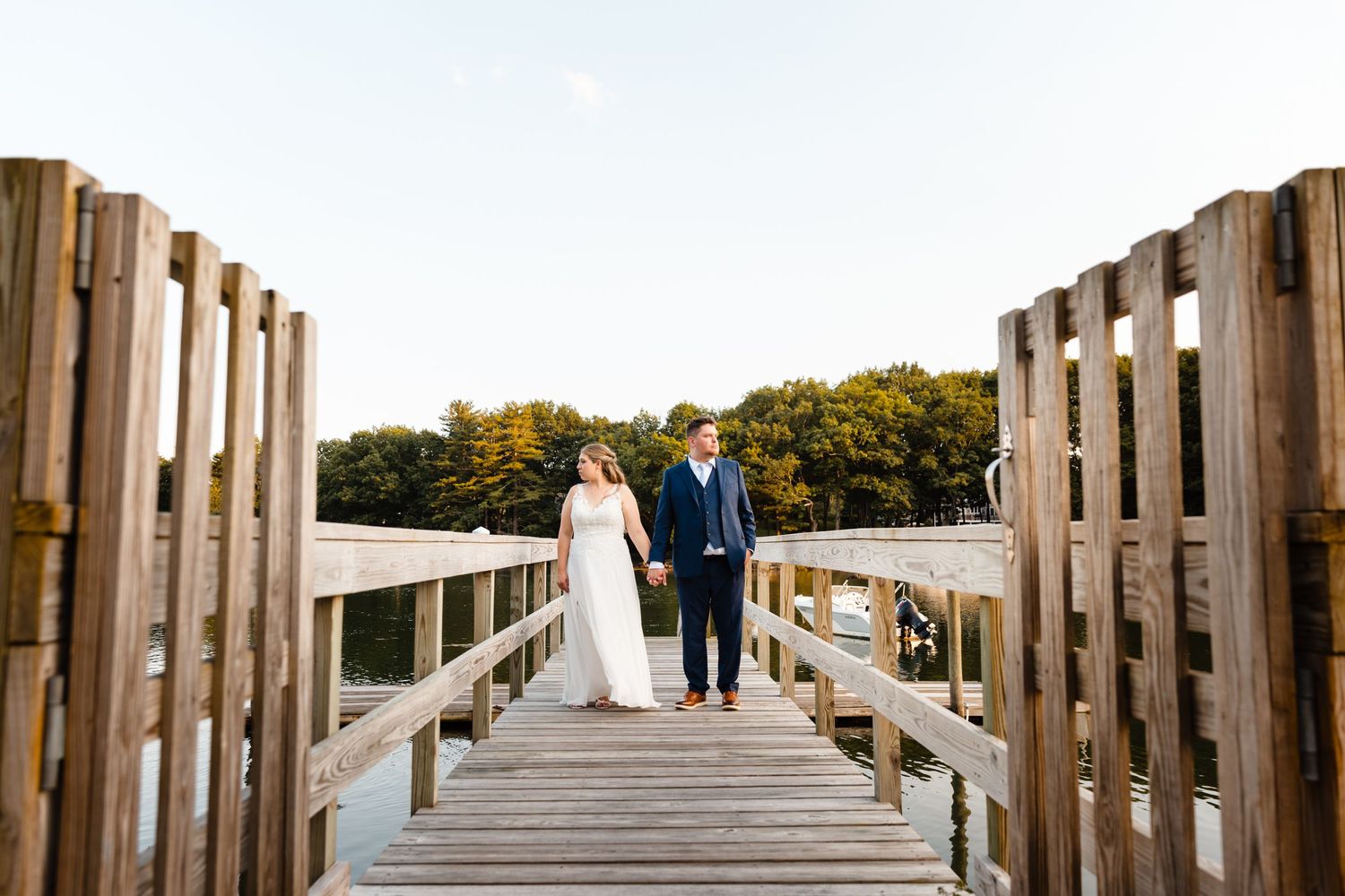 Waterfront at the Elks bride and groom portrait on bridge at sunset in Portsmouth, NH