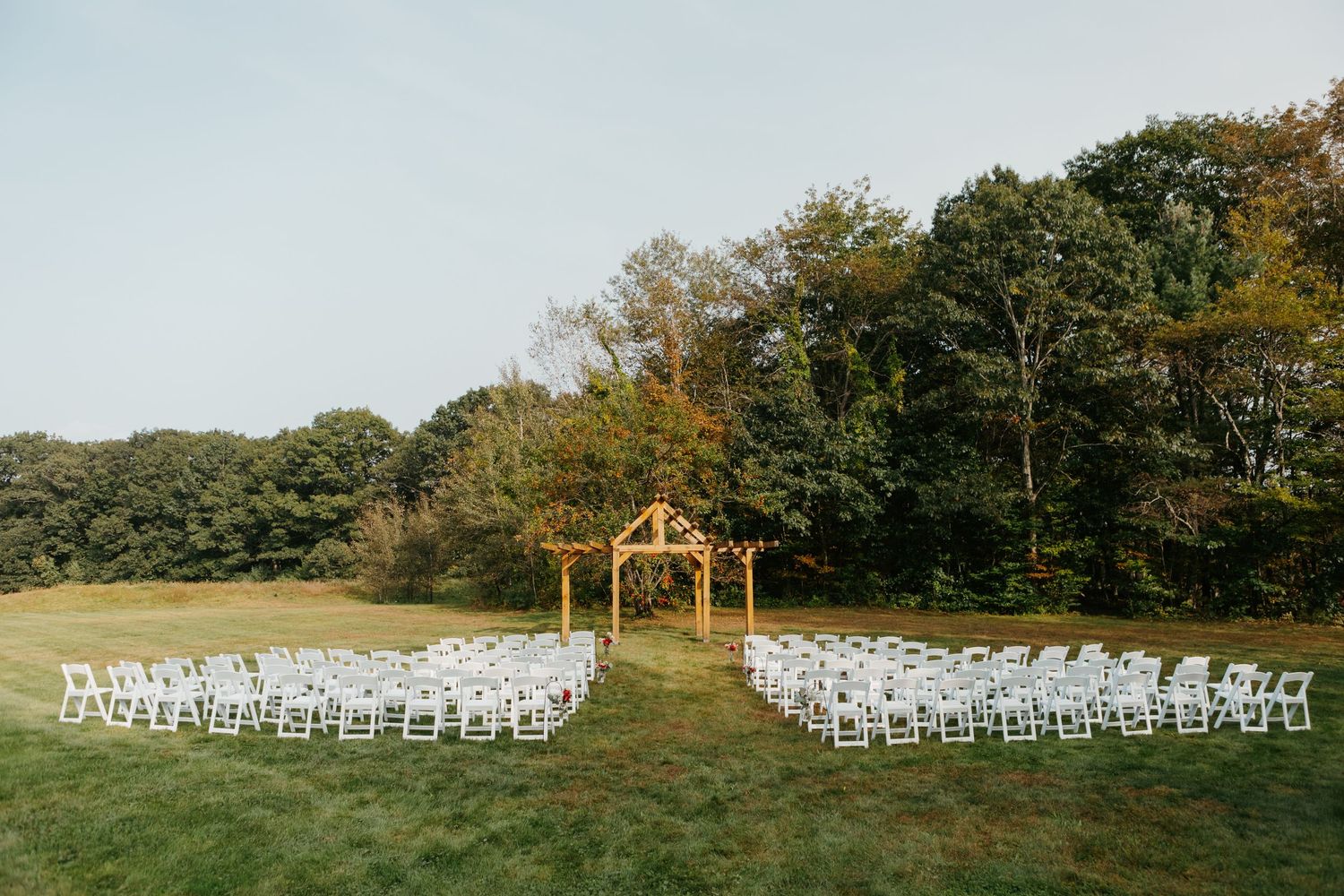 Andover Barn Wedding fall ceremony area at sunset Andover NH