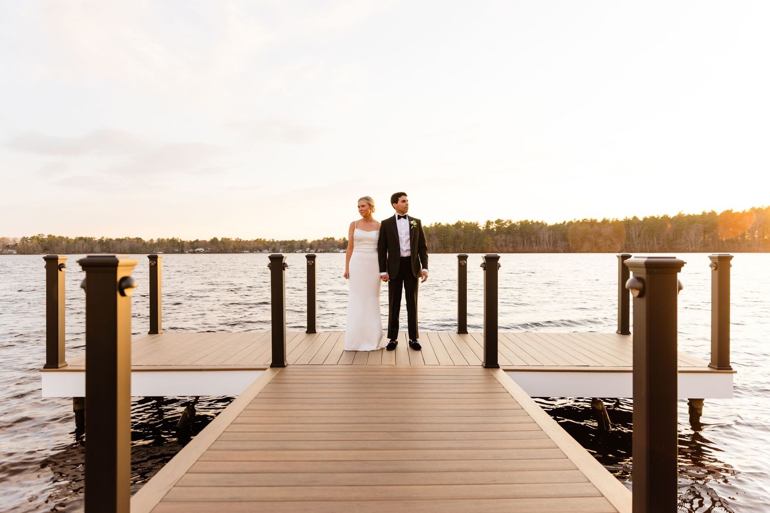 The Lakehouse Halifax MA wedding bride and groom portraits on the dock at sunset