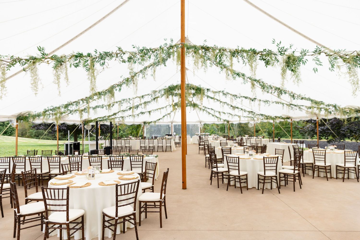 Westbrook Inn wedding tent reception greenery and string lights reception area tables cocktail hour summer Derry NH